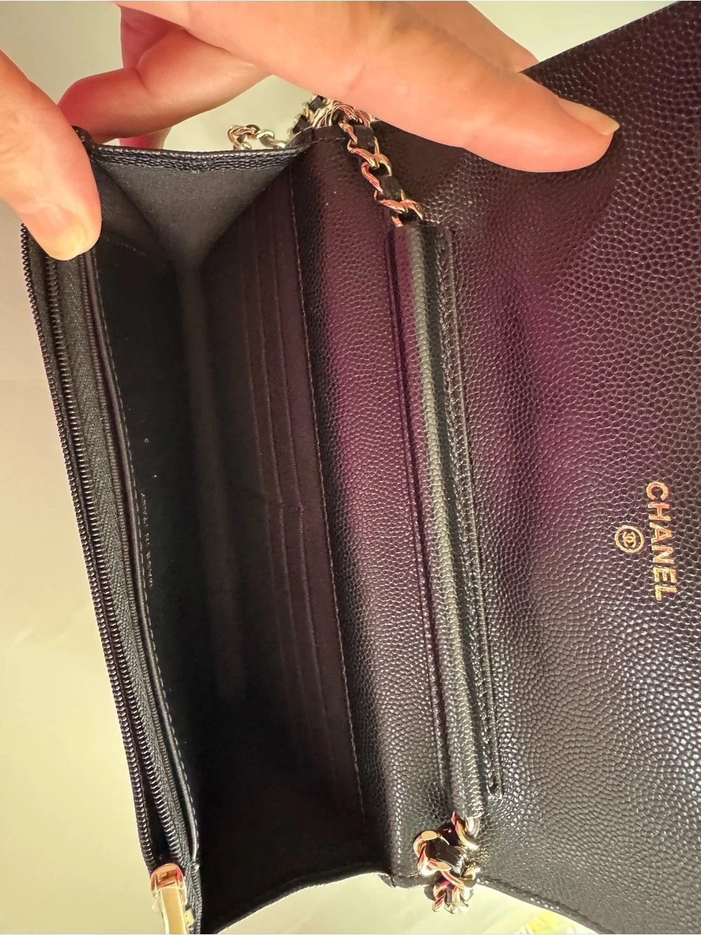CHANEL WOC Black caviar leather with Gold Hardware and heart shaped crystal logo